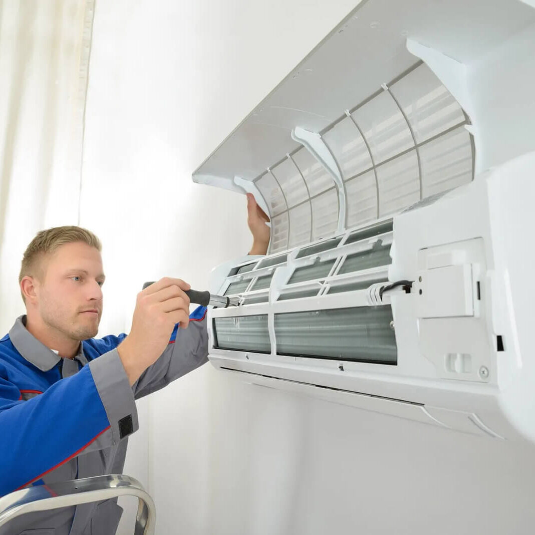 Electrician Fixing the Split AC